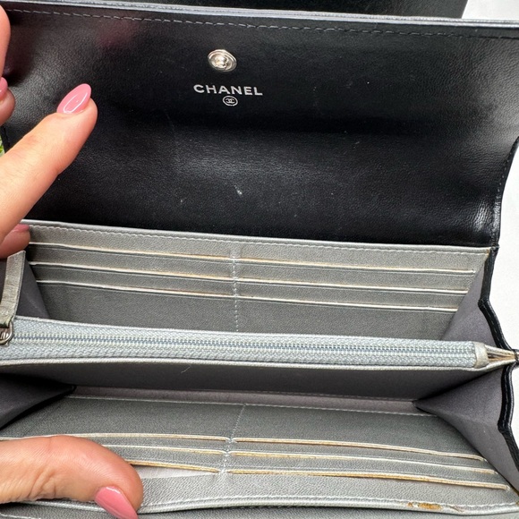 CHANEL 
Caviar Camellia Embossed Flap Wallet Black - Picture 9 of 14